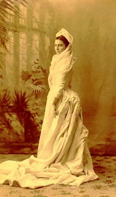 Mary Frances Hill in her wedding dress, showcasing her style and historical significance.